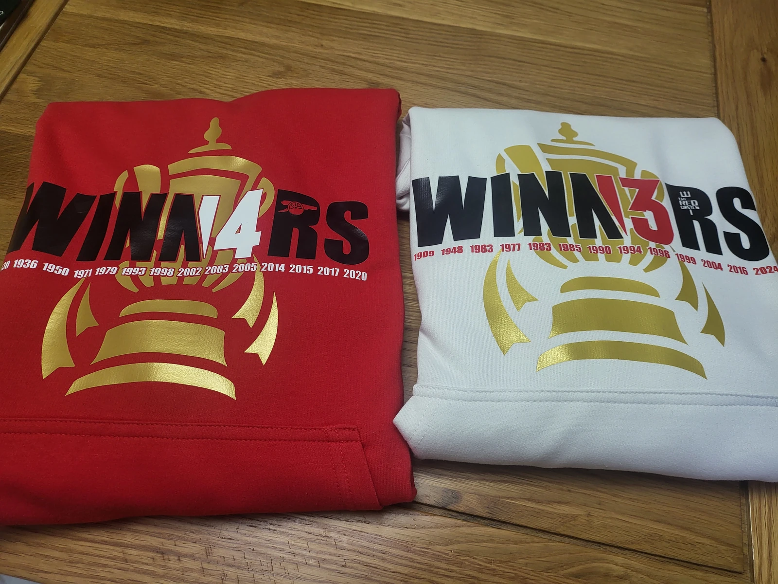 Arsenal & Man United FA cups - hoodies packed