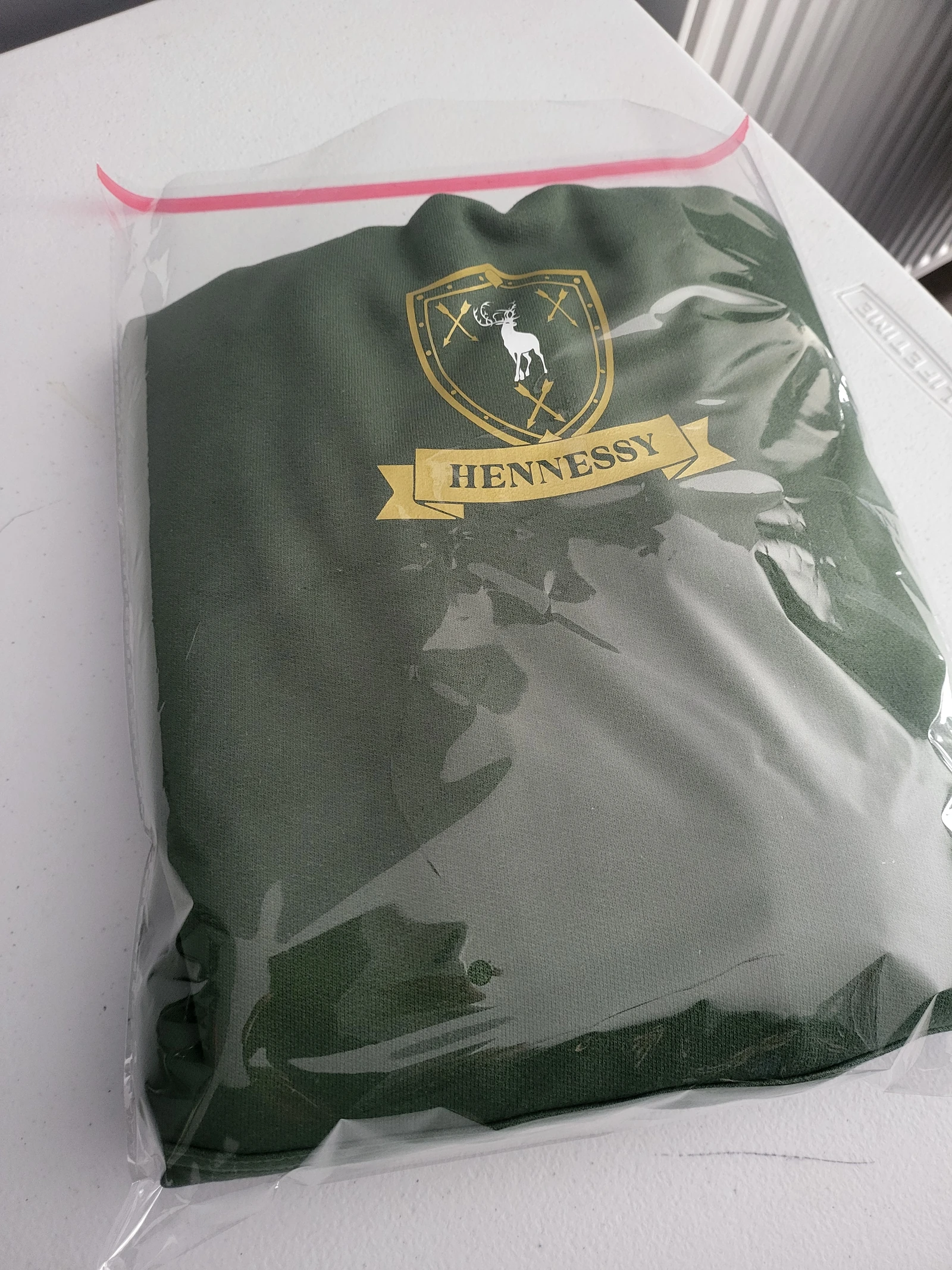 Hennessy - hoodie green packed